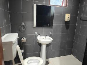 Afbeelding uit fotogalerij van TERENGGANU EQUESTRIAN RESORT (PADDOCK INN) in Kuala Terengganu