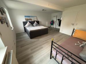 a bedroom with a bed in a room at Finca Bornrows Nähe Bad Oeynhausen in Vlotho