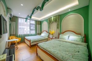 เตียงในห้องที่ Zhangjiajie Han Exotic Inn