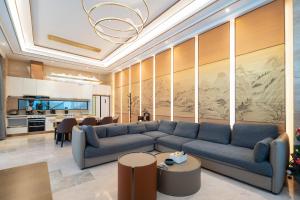 Posedenie v ubytovaní Sanya Haitang Bay Muyu Time Seaview Apartment