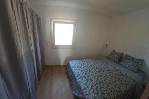 Ένα ή περισσότερα κρεβάτια σε δωμάτιο στο Appartement Duplex proche de la mer