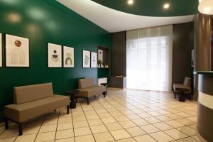 Posezení v ubytování RRRapido Hotel