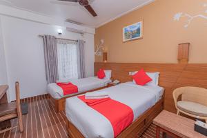 Letto o letti in una camera di Basundhara Resort Pokhara