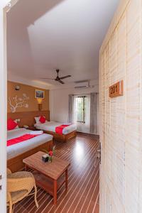 Letto o letti in una camera di Basundhara Resort Pokhara