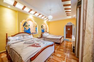 เตียงในห้องที่ Zhangjiajie Han Exotic Inn