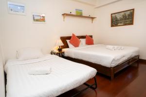 Letto o letti in una camera di Greenery Hostel