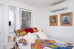 Cama o camas de una habitación en House GARDEN