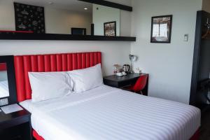Postelja oz. postelje v sobi nastanitve Kalya Hotel Bandung Dago