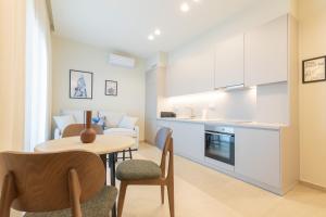 Cucina o angolo cottura di Palm View Suites