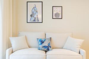 Area soggiorno di Palm View Suites
