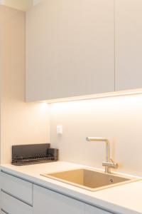 Cucina o angolo cottura di Palm View Suites