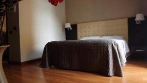 Voodi või voodid majutusasutuse Hotel Nautilus toas