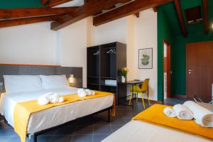 Postel nebo postele na pokoji v ubytování RRRapido Hotel