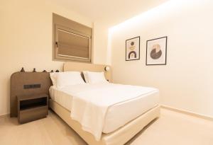 Letto o letti in una camera di Palm View Suites