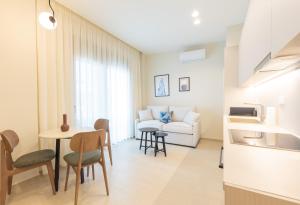 Area soggiorno di Palm View Suites