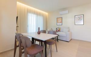 Area soggiorno di Palm View Suites