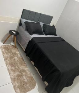Ένα ή περισσότερα κρεβάτια σε δωμάτιο στο Central flats