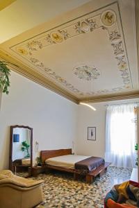 Postel nebo postele na pokoji v ubytování Tiritù Apartments