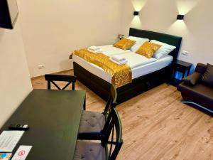 Postel nebo postele na pokoji v ubytování Atlas Berlin Hotel