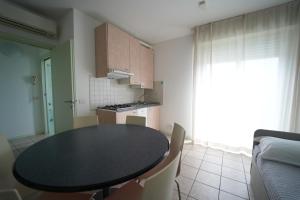 Kuchyň nebo kuchyňský kout v ubytování Lugano Residence