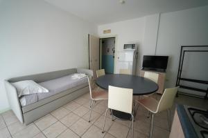 TV a/nebo společenská místnost v ubytování Lugano Residence