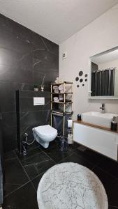 Koupelna v ubytování Value Living Apartment