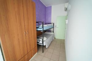 Postel nebo postele na pokoji v ubytování Lugano Residence