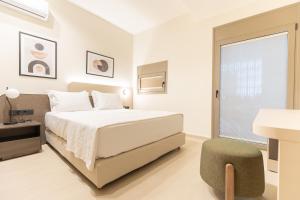 Letto o letti in una camera di Palm View Suites
