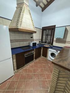 Kuchyň nebo kuchyňský kout v ubytování Villa Los abuelos
