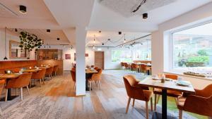 ห้องอาหารหรือที่รับประทานอาหารของ Hotel Schluister Park