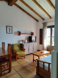 A kitchen or kitchenette at Apartamentos El Calambuco