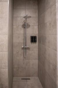 Ένα μπάνιο στο HANNIBAL - Design Apartment Orchidee 5, VW Nähe, Parkplatz, Küche, HighSpeed-WLAN, Fitness, Solarium