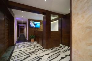 Et tv og/eller underholdning på Menoir Dorsett Madrid Usera