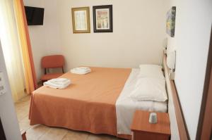Postel nebo postele na pokoji v ubytování Hotel Ariston Riccione