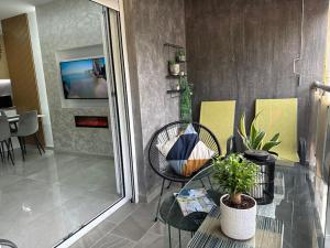 TV a/nebo společenská místnost v ubytování Duka Apartment