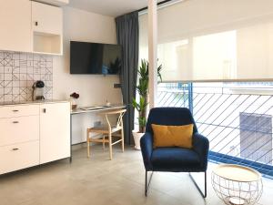 Kuchyň nebo kuchyňský kout v ubytování PATIOdeLUZ - Stylish apartments in Párraga 13