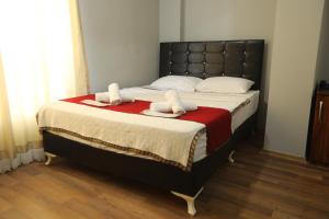 Postel nebo postele na pokoji v ubytování BALŞEN HOTEL