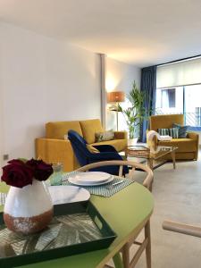 Posezení v ubytování PATIOdeLUZ - Stylish apartments in Párraga 13 + 37 fotografií