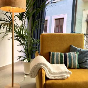 Posezení v ubytování PATIOdeLUZ - Stylish apartments in Párraga 13