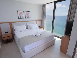 Letto o letti in una camera di Sunrise Qeparo