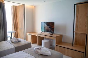 Letto o letti in una camera di Sunrise Qeparo