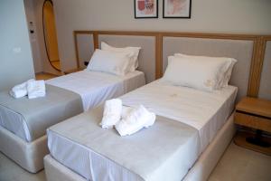 Letto o letti in una camera di Sunrise Qeparo