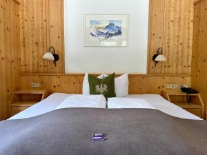Postel nebo postele na pokoji v ubytování Hotel Zirbenhof