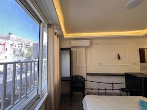 Postel nebo postele na pokoji v ubytování Nobel Hotel