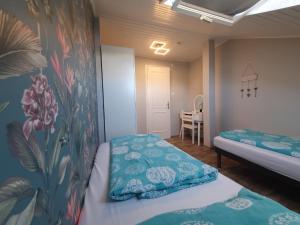 Posteľ alebo postele v izbe v ubytovaní Lara Apartments