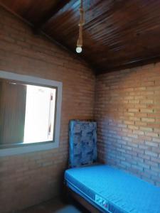 Postel nebo postele na pokoji v ubytování Chalé Mandala de Pedra