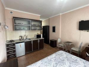 Η κουζίνα ή μικρή κουζίνα στο Orbi Towers by the Sea +12 φωτογραφίες