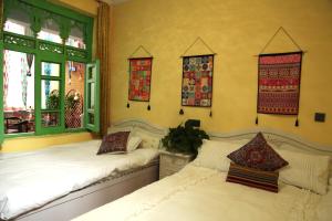 Postelja oz. postelje v sobi nastanitve 喀什故人归国际青年旅舍 Kashgar Returning Friends International Youth Hostel
