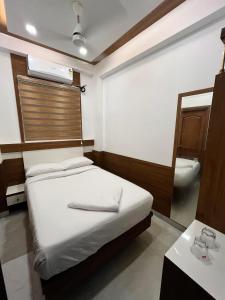 Welcome Hotels客房内的一张或多张床位