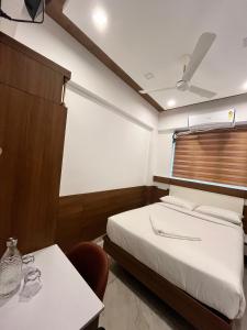 Welcome Hotels客房内的一张或多张床位